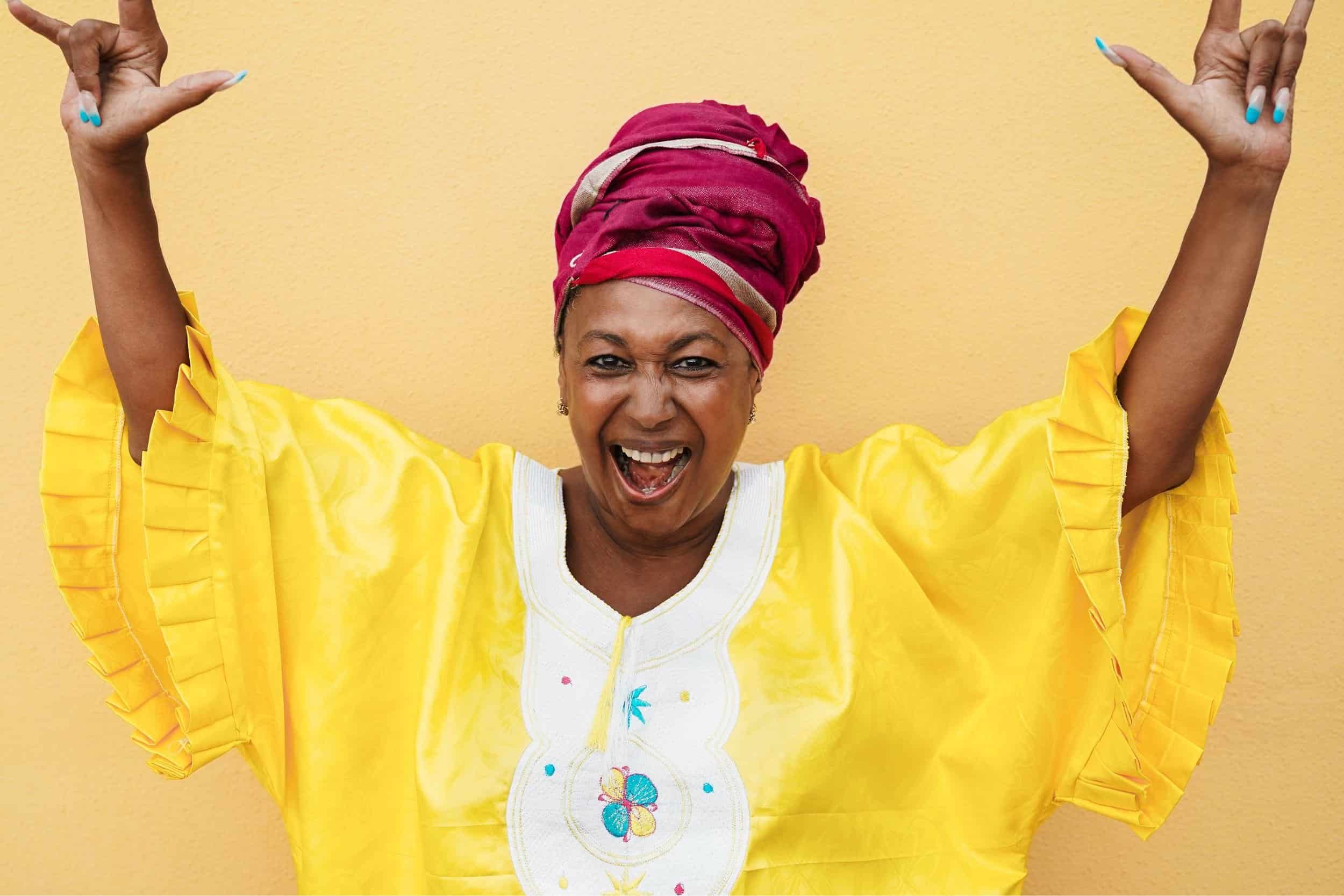 woman in her 40s showing a wacky pose brightly