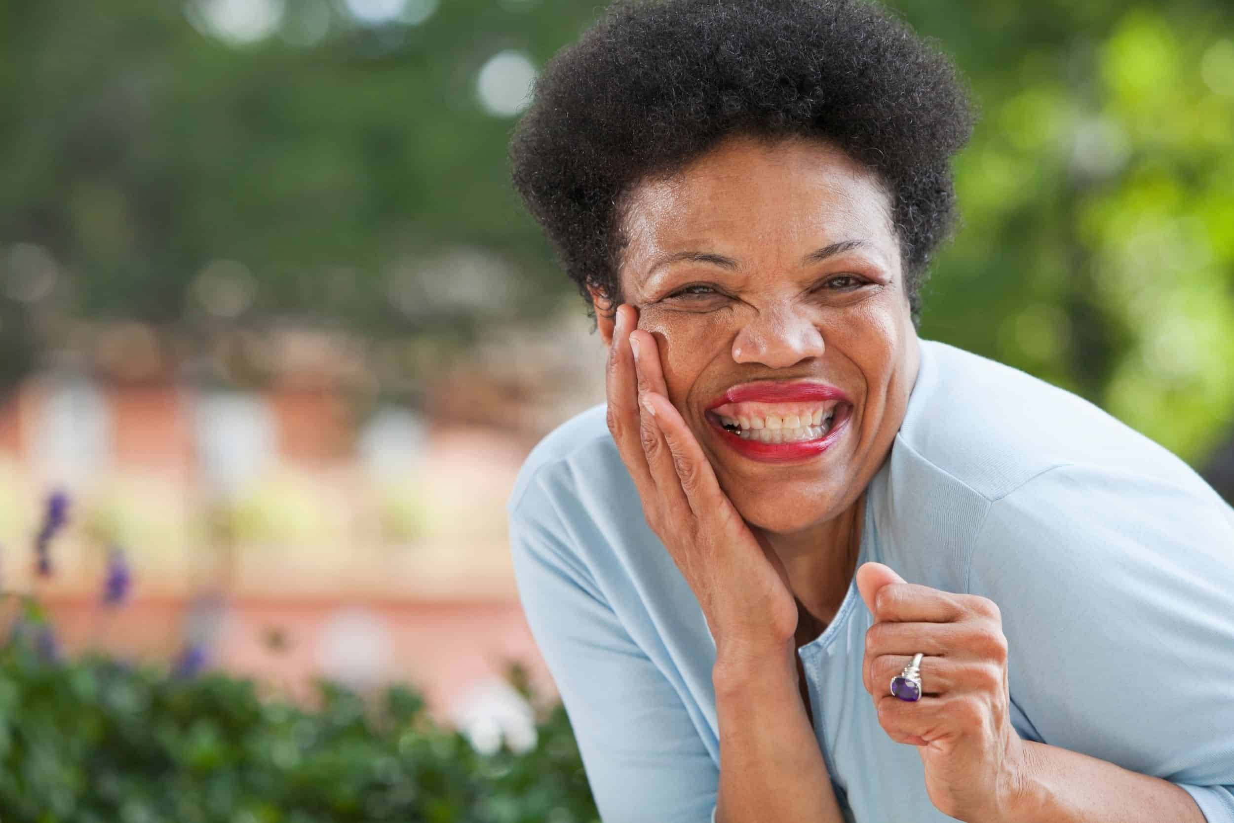 woman smiling brightly for the camera